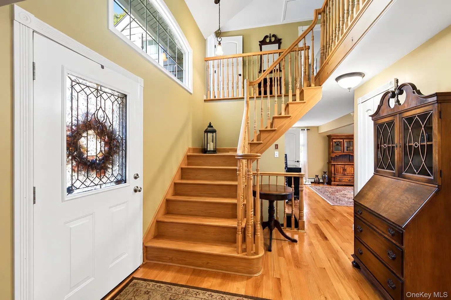 Formal entry way with grand HB Millwork Staircase & Railings. Formal entry way with grand HB Millwork Staircase & Railings.