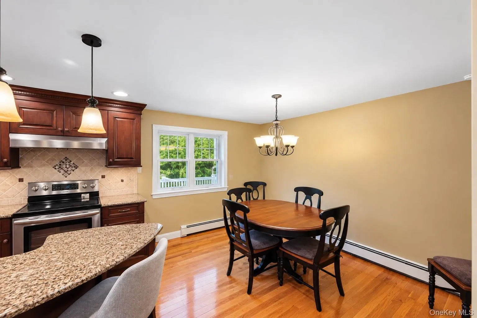 Dining room open to kitchen and living room. Dining room open to kitchen and living room.