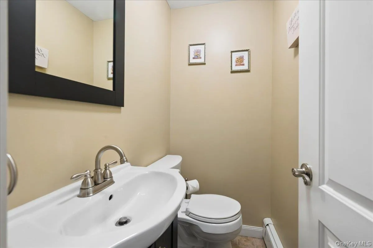 Powder room off the den. Powder room off the den.