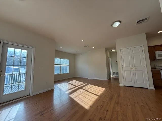 Empty room featuring recessed lighting and light wood-style floors Empty room featuring recessed lighting and light wood-style floors
