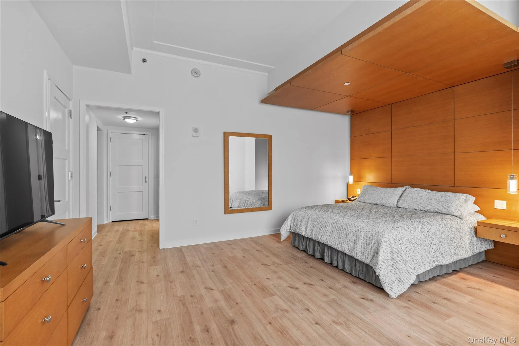 Bedroom featuring light wood-style floors Bedroom featuring light wood-style floors