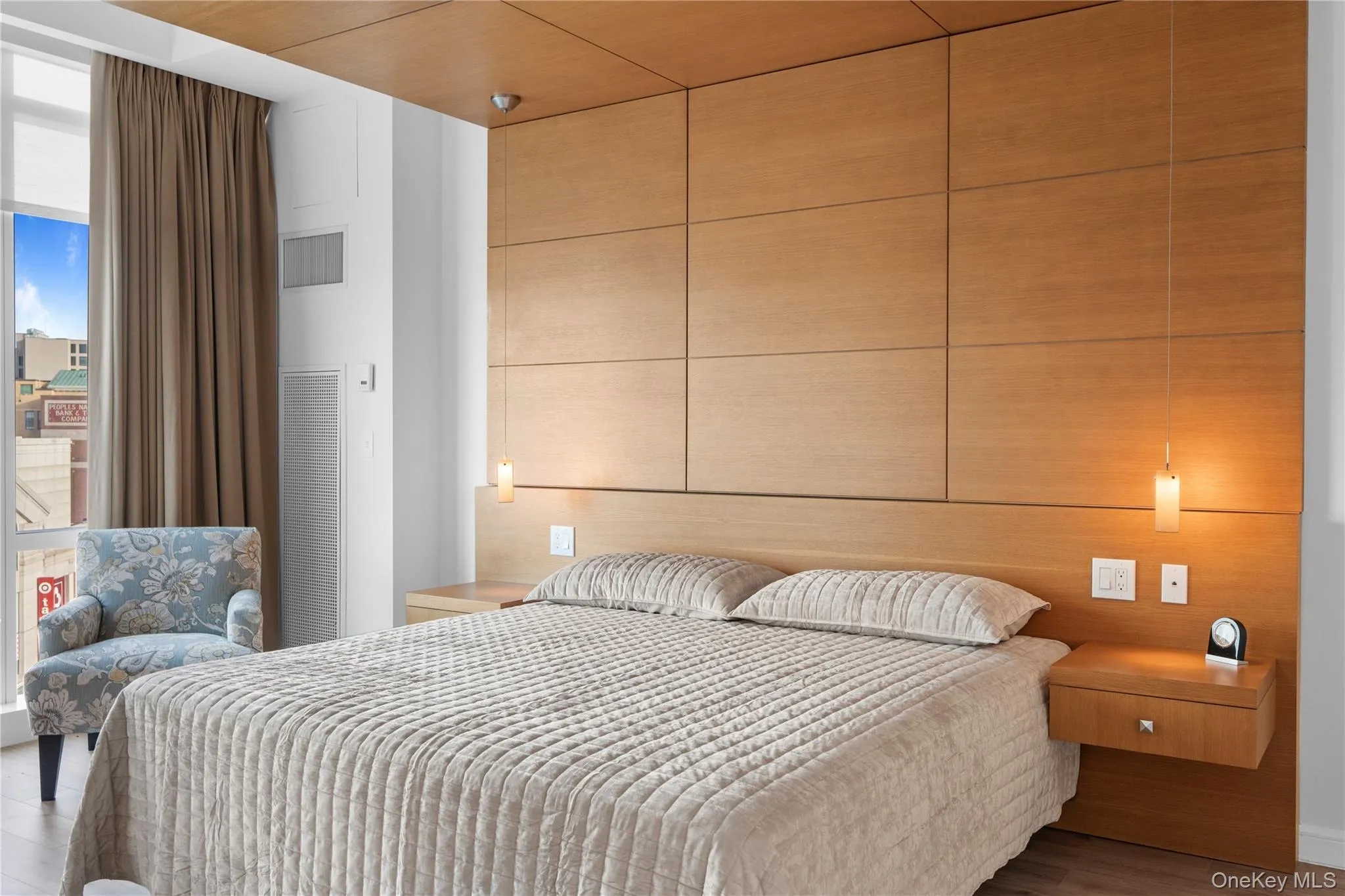 Bedroom featuring wood finished floors Bedroom featuring wood finished floors