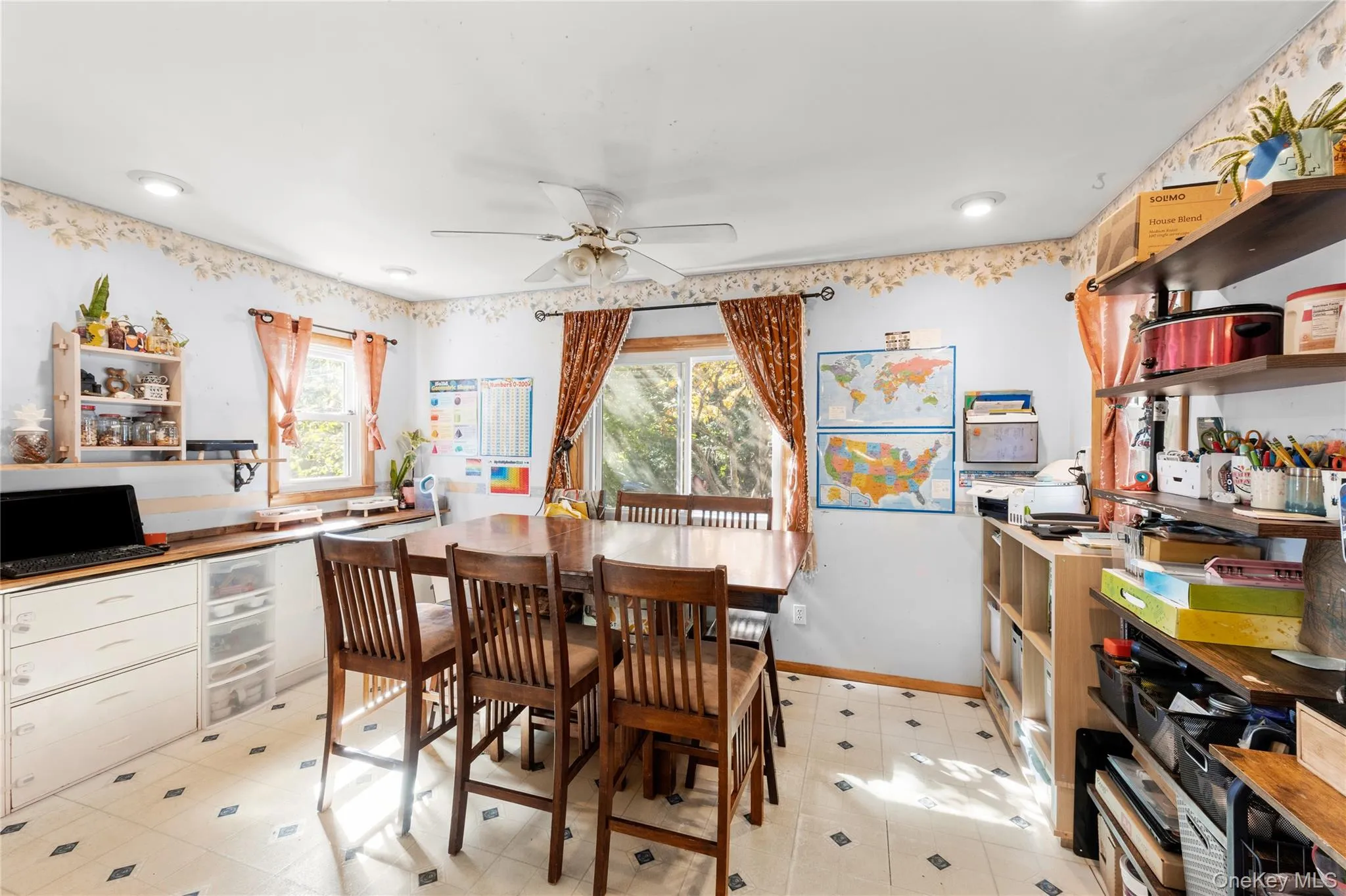 Tile flooring with inlaid accents, ceiling fan with integrated lighting, recessed lighting, and windows with integrated hardware Tile flooring with inlaid accents, ceiling fan with integrated lighting, recessed lighting, and windows with integrated hardware