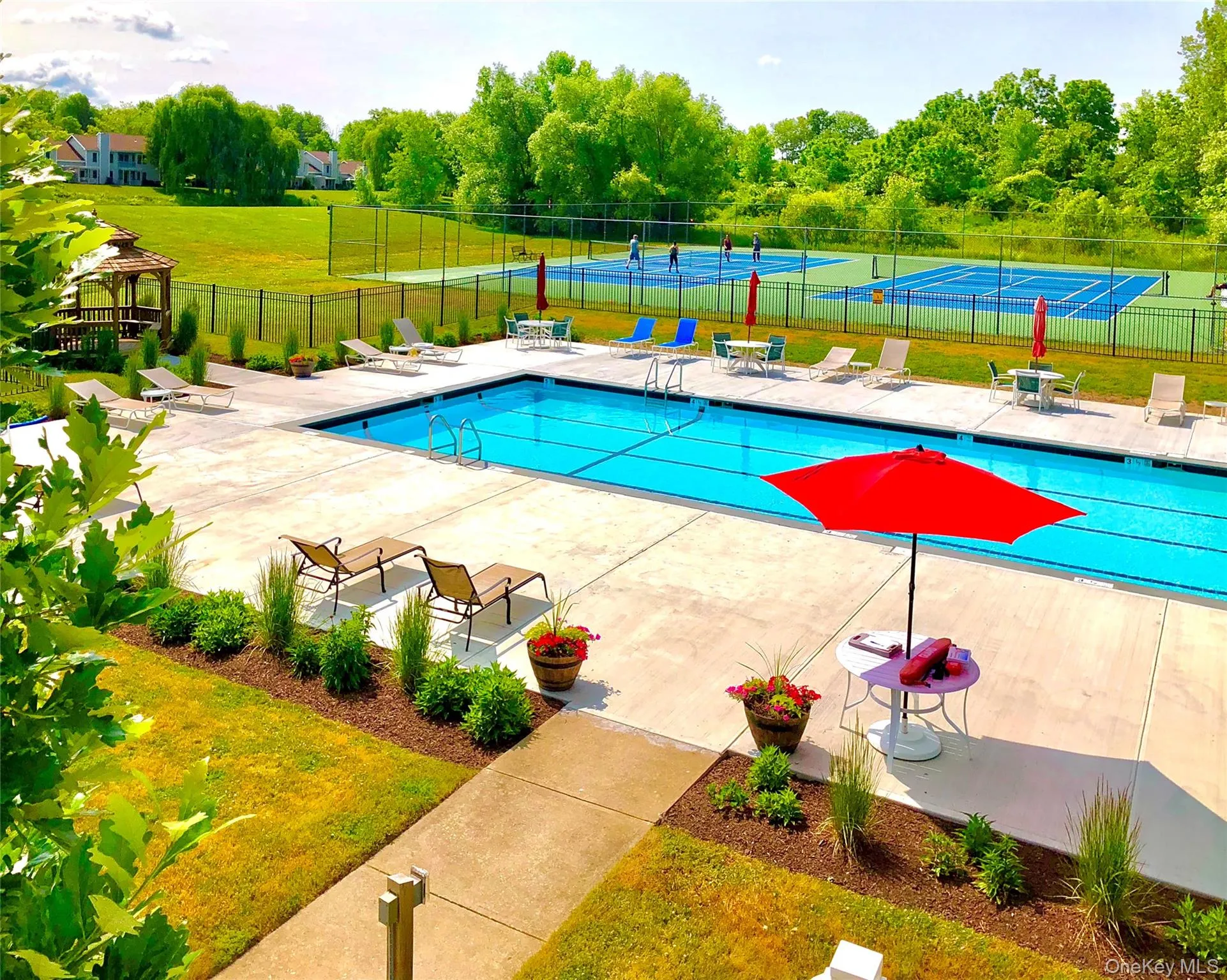 Pool, tennis courts and pickle board Pool, tennis courts and pickle board
