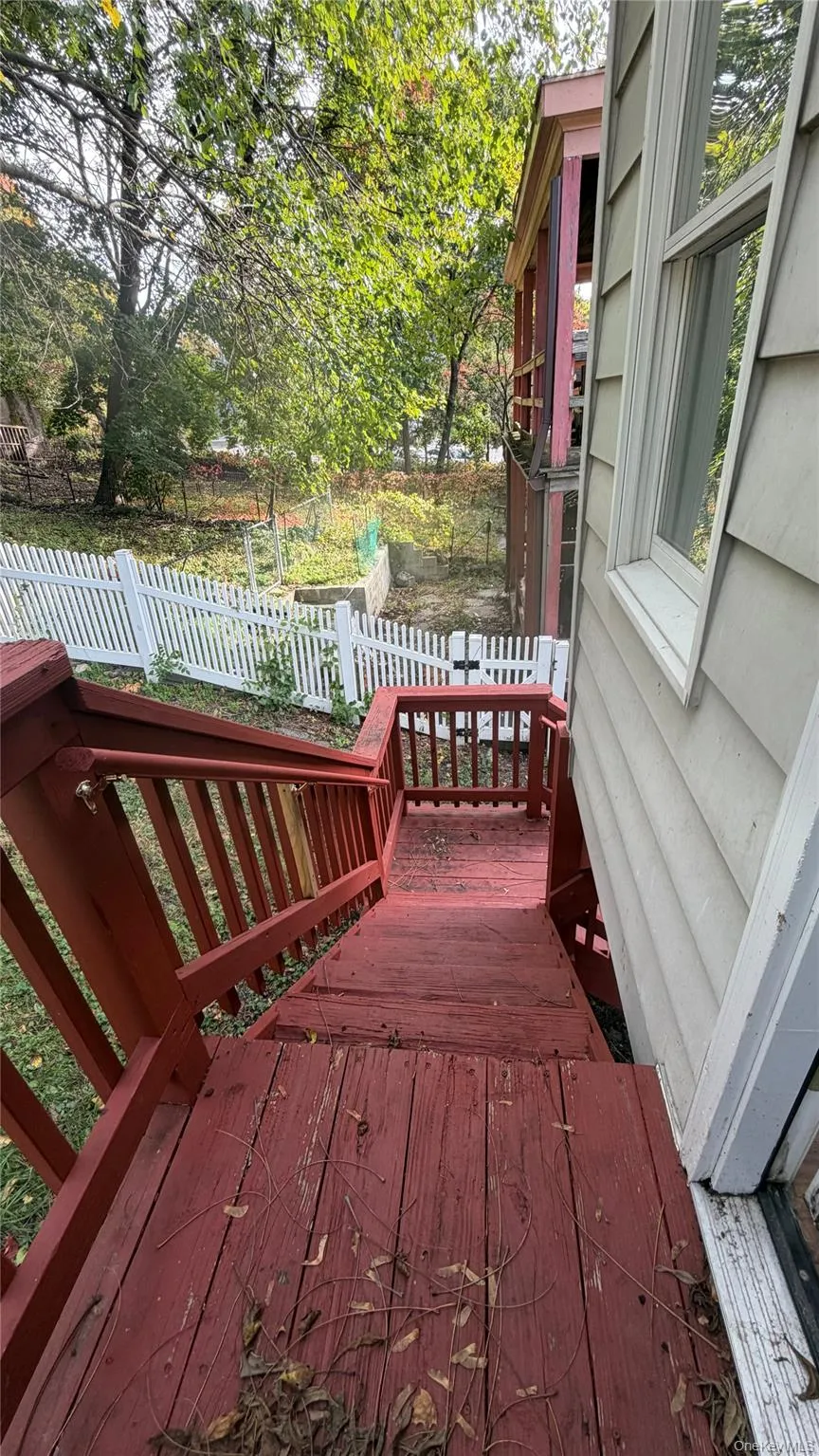 Back door to deck to yard Back door to deck to yard