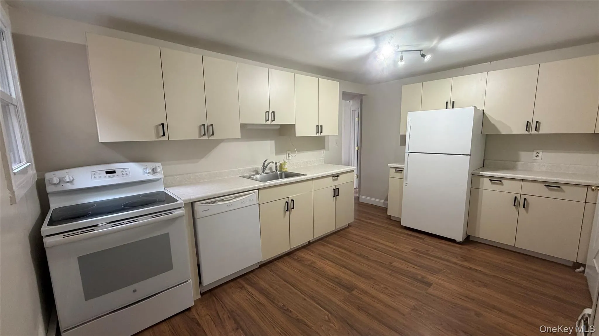 Large Kitchen with lots of cabinets and dishwasher Large Kitchen with lots of cabinets and dishwasher