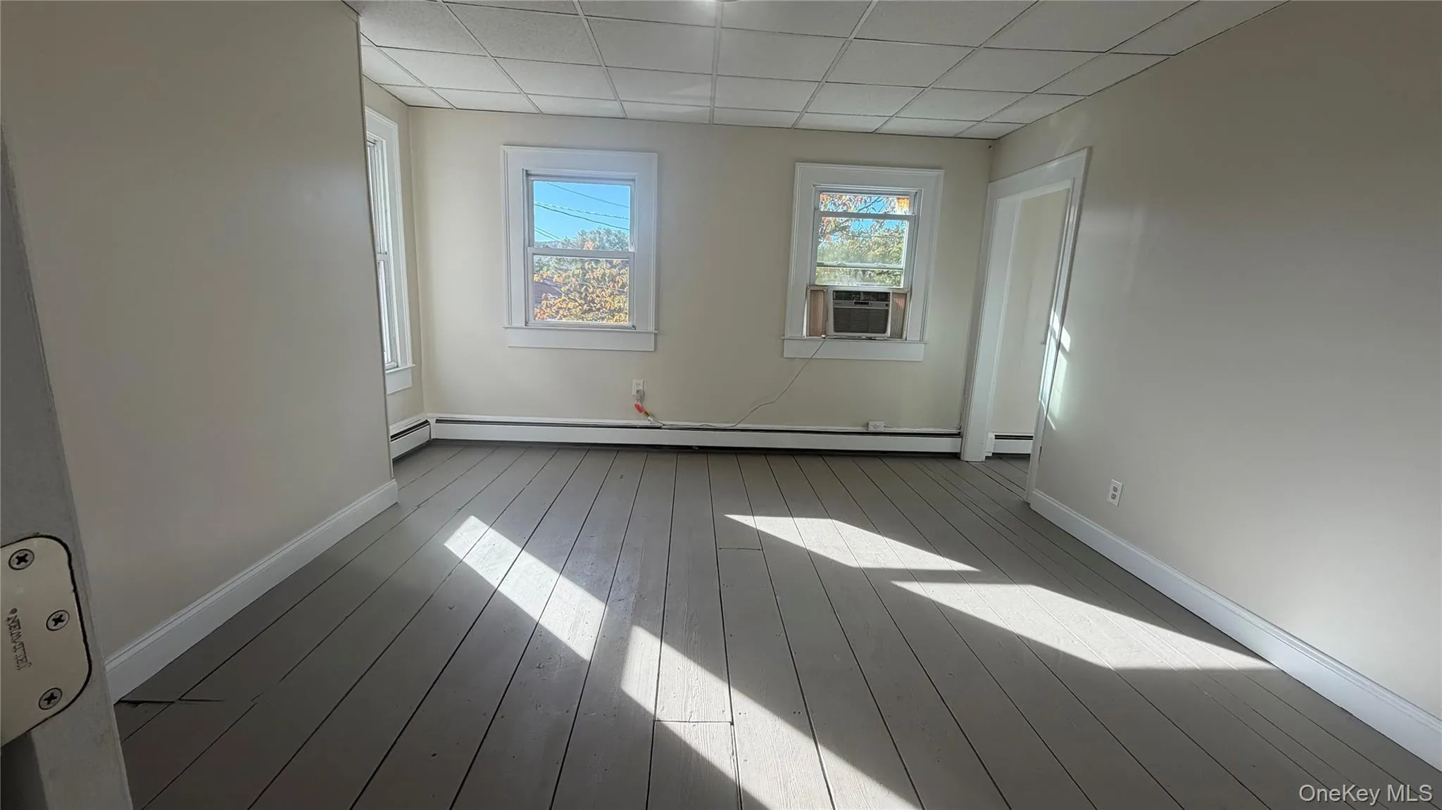 Large Master Bedroom with hardwood floors Large Master Bedroom with hardwood floors
