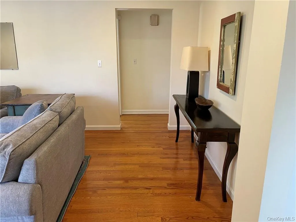 Living room with hardwood / wood-style floors Living room with hardwood / wood-style floors