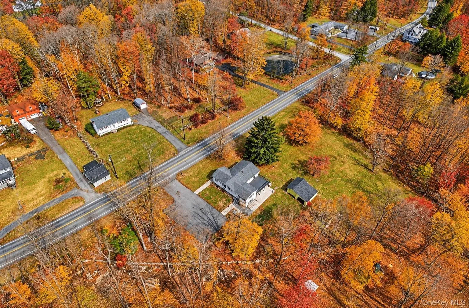 Beautiful aerial view of the home and property*This photo has been seasonally digitally enhanced. Property features remain unchanged. Beautiful aerial view of the home and property*This photo has been seasonally digitally enhanced. Property features remain unchanged.