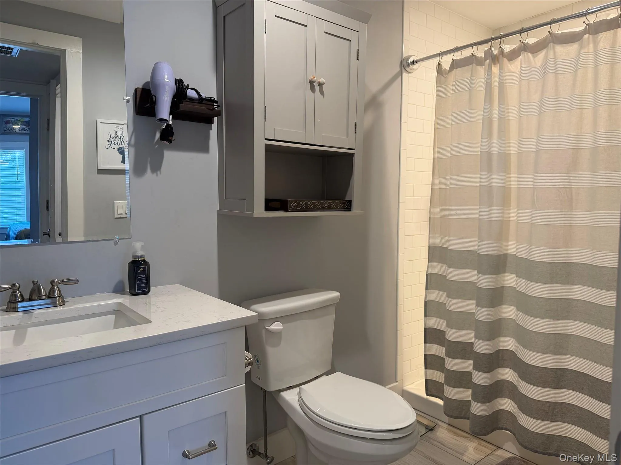 Full Bathroom with Walk-in-Shower. Full Bathroom with Walk-in-Shower.