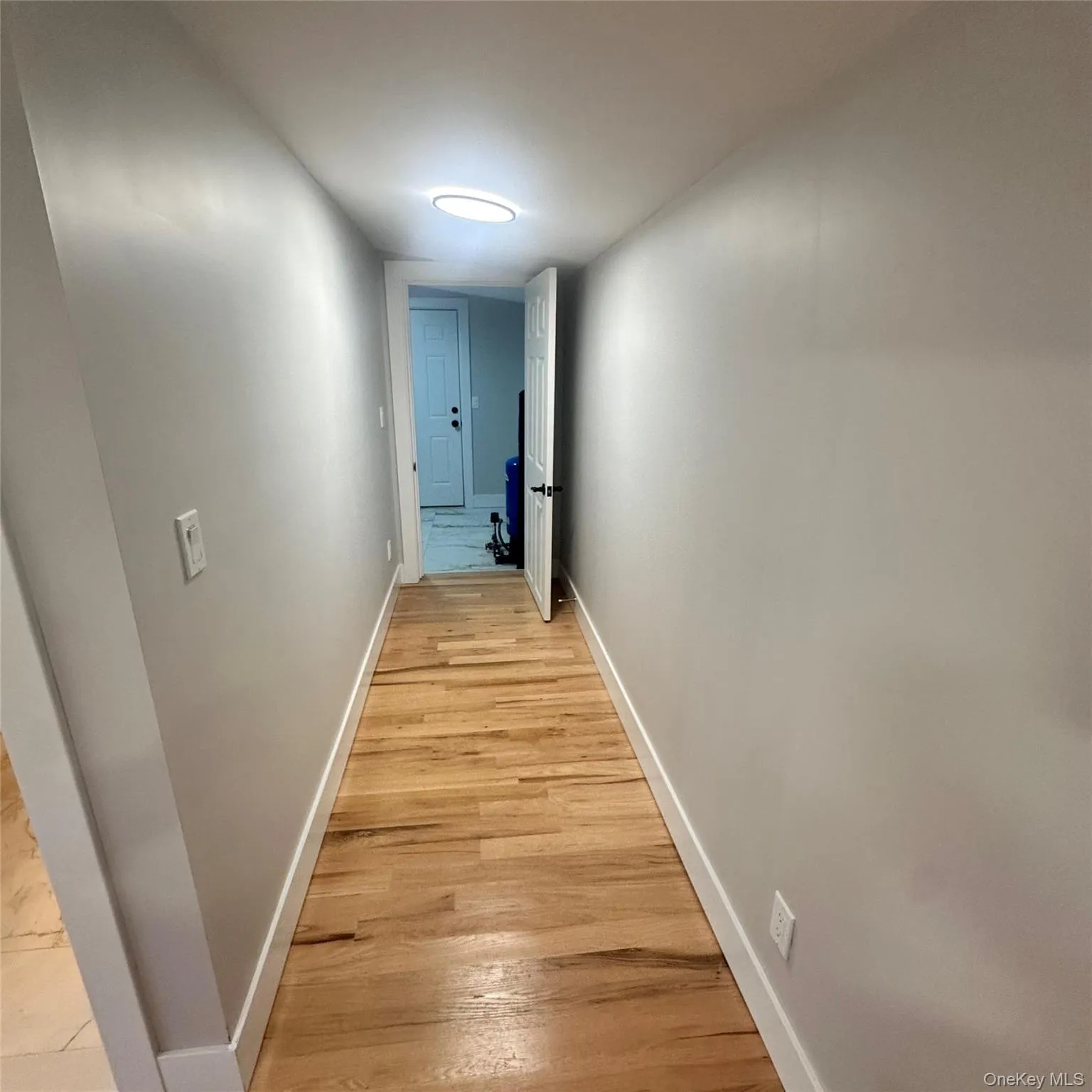 Hard wood flooring, access to the laundry room and back yard. Hard wood flooring, access to the laundry room and back yard.