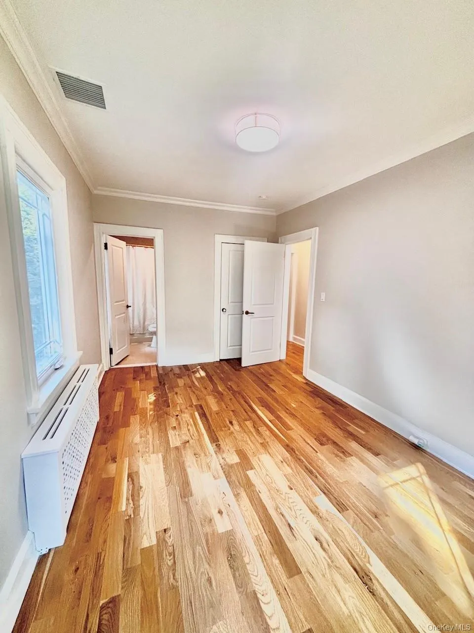 Ensuite bedroom with recessed lighting, marble bath Ensuite bedroom with recessed lighting, marble bath