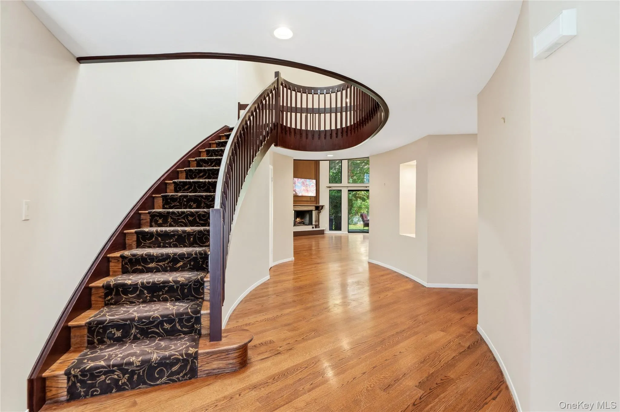 Dramatic entrance to a winding staircase Dramatic entrance to a winding staircase