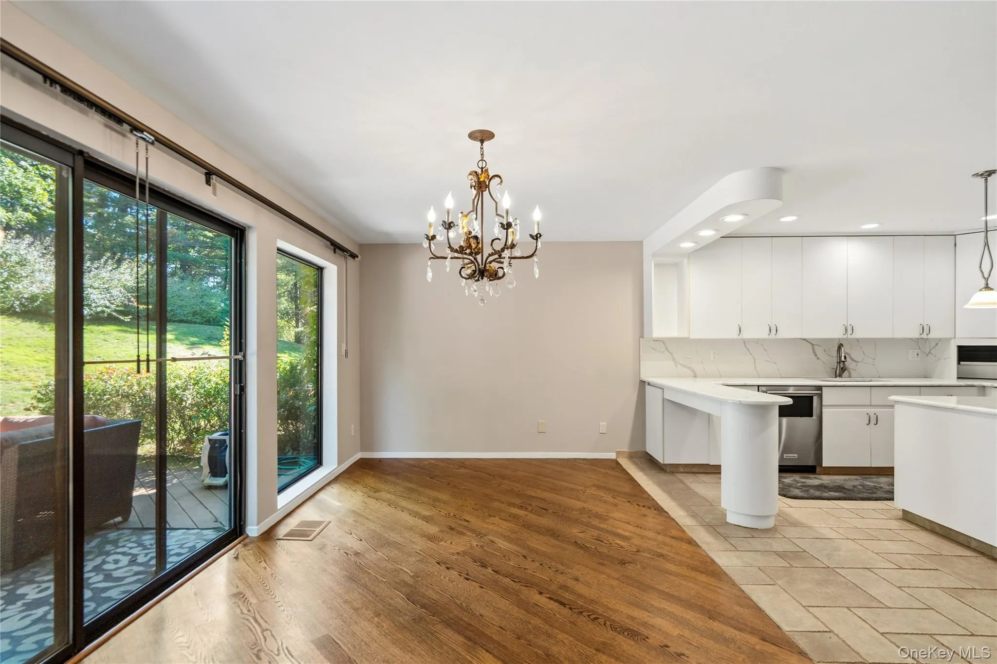 Spacious Dining Area with Sliders to Deck Spacious Dining Area with Sliders to Deck