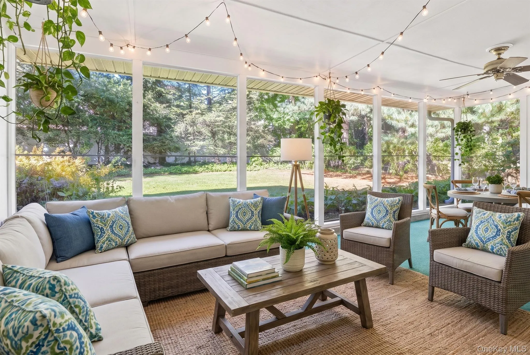 LOWER LEVEL- Screened Sunroom - STAGED LOWER LEVEL- Screened Sunroom - STAGED