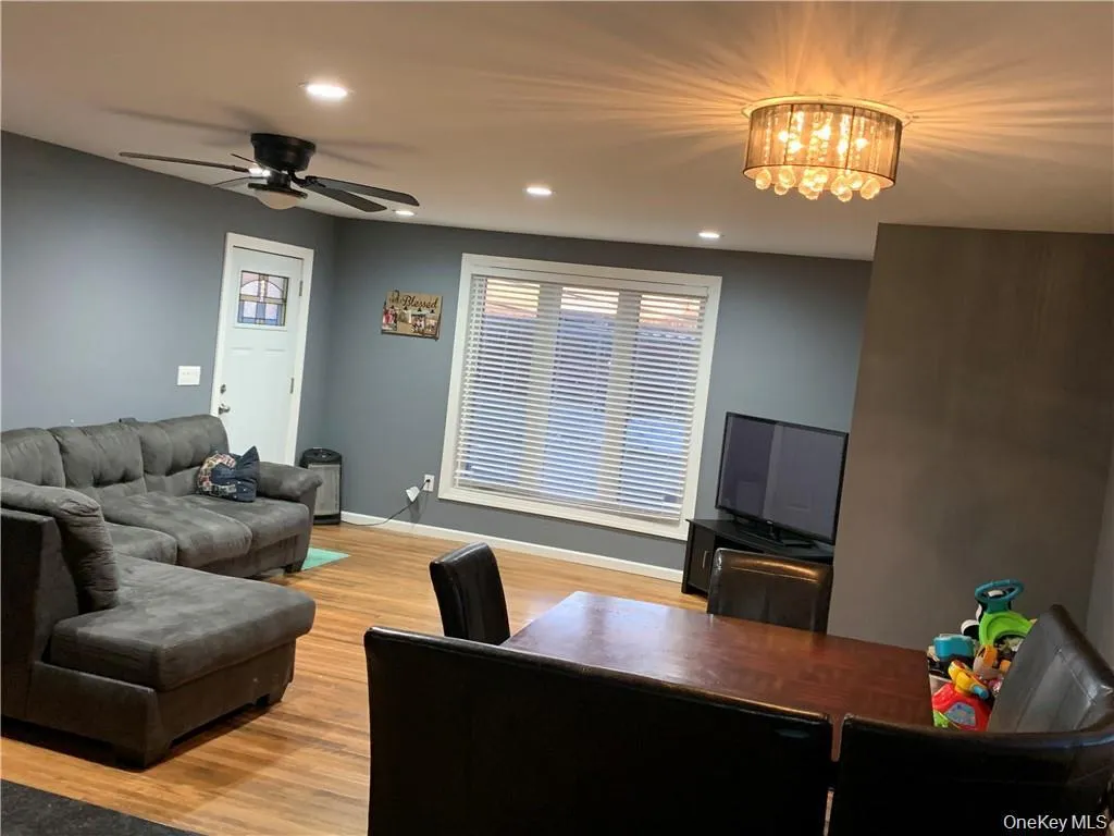 Entrance with triple windows spacious living/dining comb Entrance with triple windows spacious living/dining comb