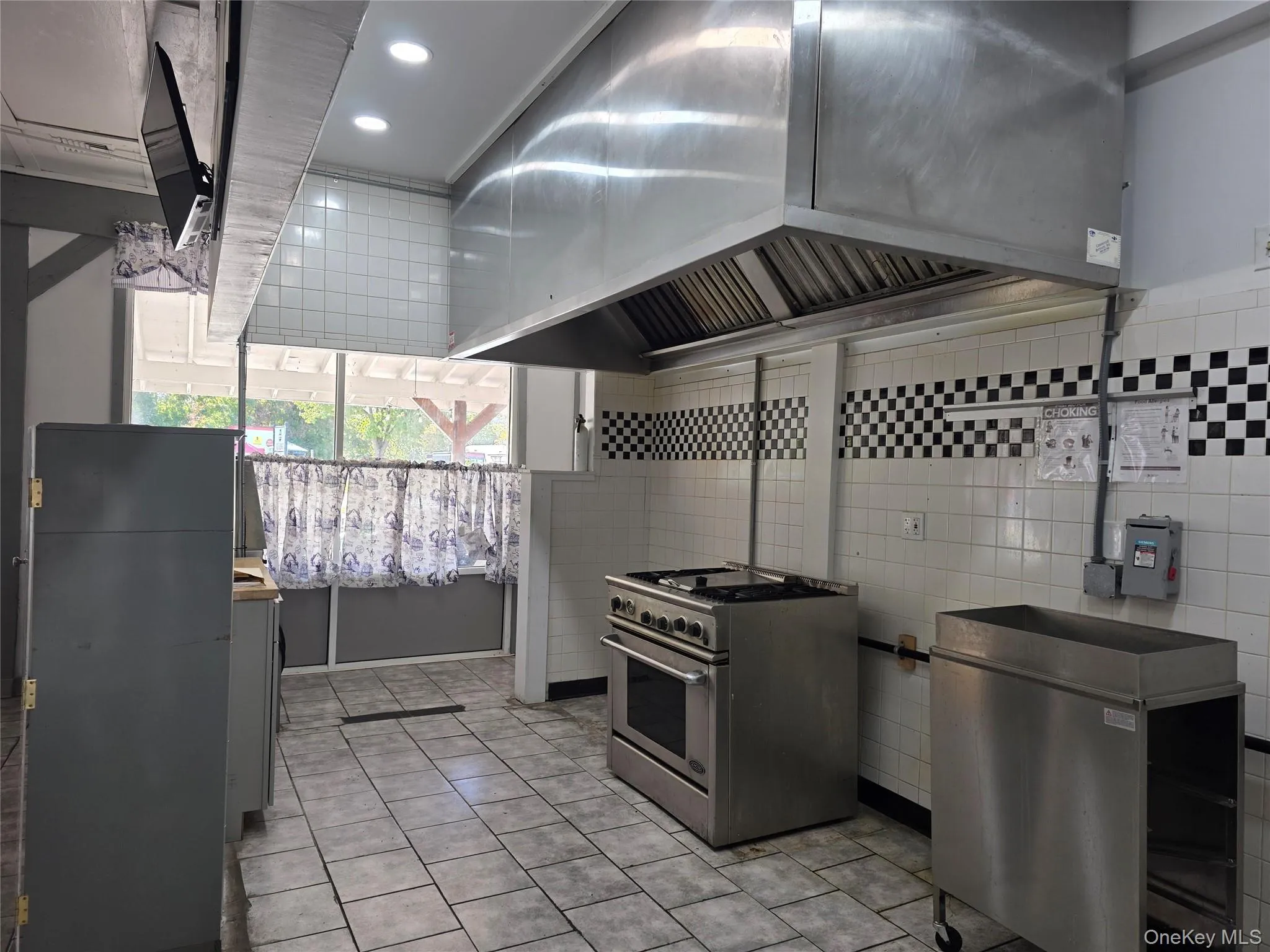 Behind counter area. Behind counter area.