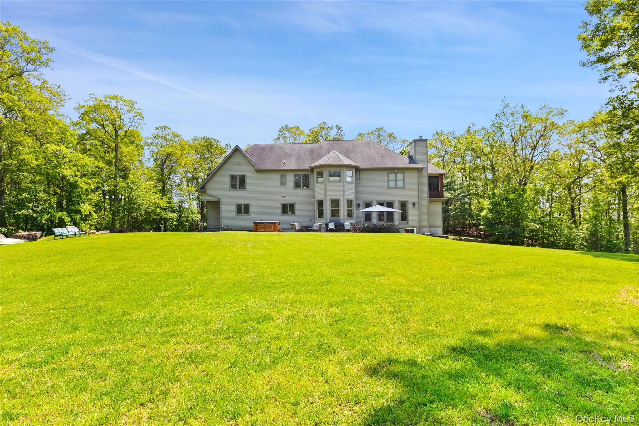 Back of property featuring 3.47 level acres Back of property featuring 3.47 level acres