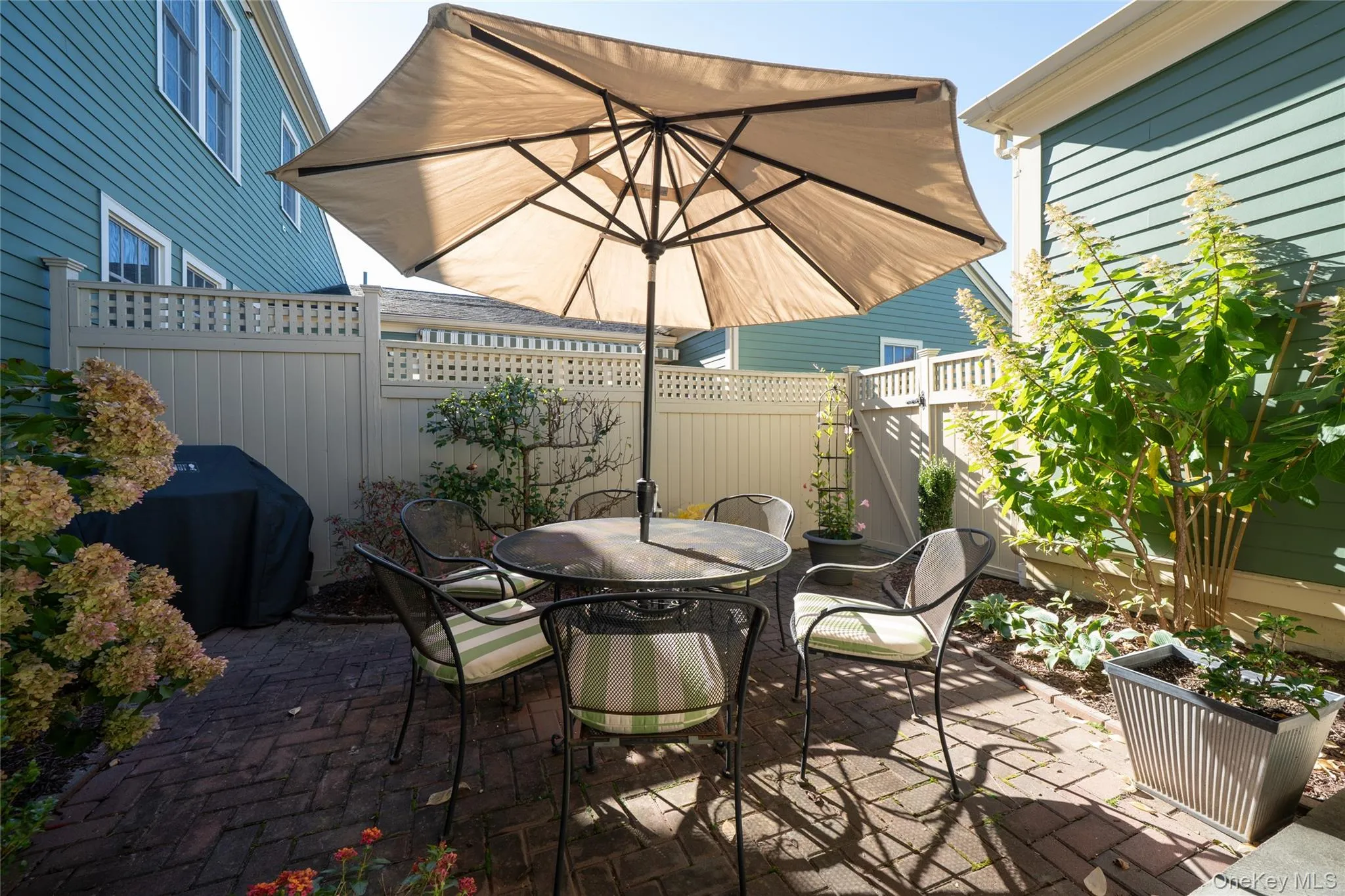 Just outside the Family Room, your private patio has room for gardens- you'll see an espaliered pear tree with grafted branches, each providing you a different variety of pears! There's also PJM rhododendron, hydrangea, honeysuckle, and variegated Solomon's Seal. Just outside the Family Room, your private patio has room for gardens- you'll see an espaliered pear tree with grafted branches, each providing you a different variety of pears! There's also PJM rhododendron, hydrangea, honeysuckle, and variegated Solomon's Seal.