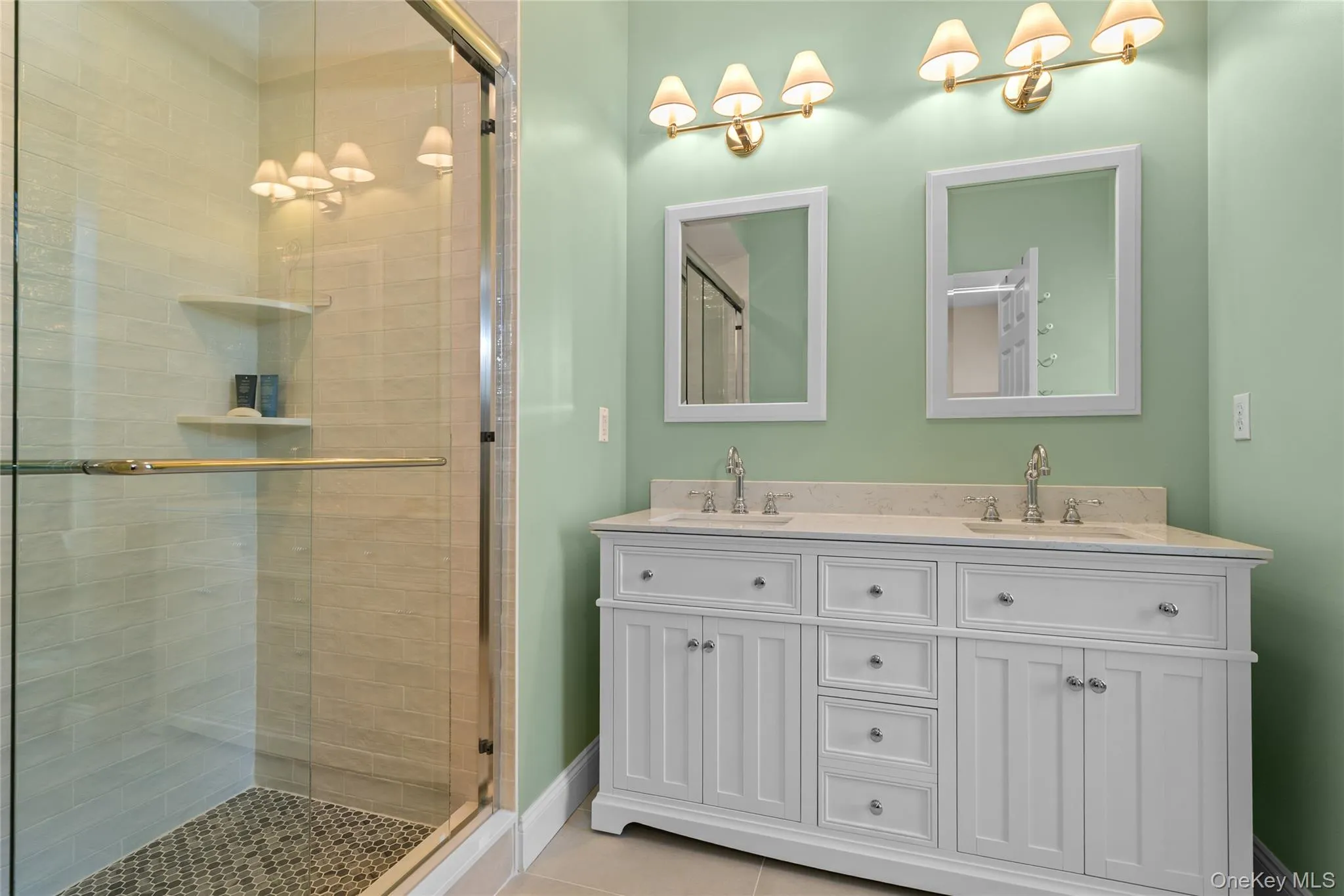 Fully renovations of the primary bathroom were completed mid-October 2026. Enjoy your brand new double sink vanity and step-in shower. Fully renovations of the primary bathroom were completed mid-October 2026. Enjoy your brand new double sink vanity and step-in shower.