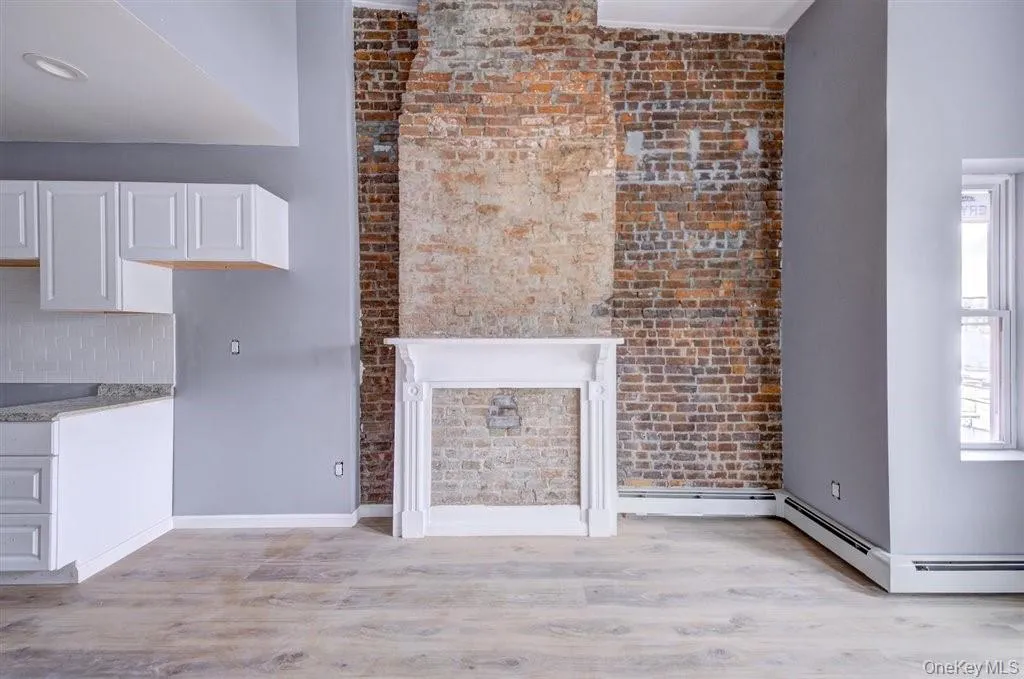 Picture of Original Mantle Place with fireplace closed Off. Picture of Original Mantle Place with fireplace closed Off.