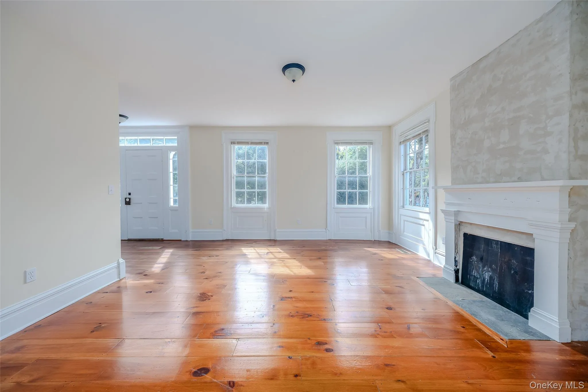 Living room with original wood flooring Living room with original wood flooring