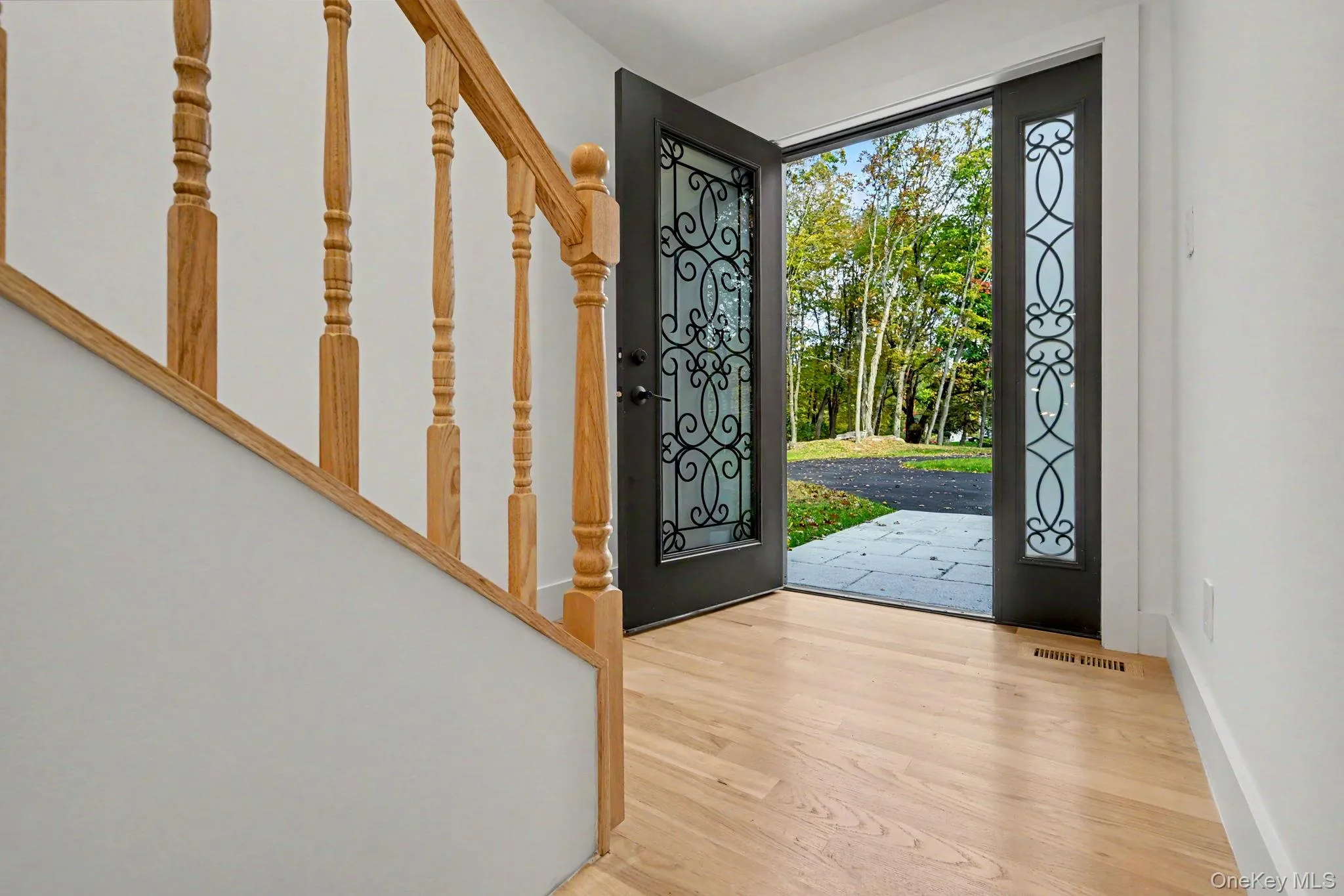 A peaceful, serene setting, 18 Laurel Road welcomes you home with a rare sense of quiet and seclusion. A peaceful, serene setting, 18 Laurel Road welcomes you home with a rare sense of quiet and seclusion.