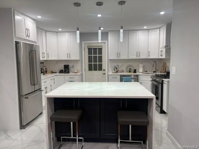 First floor Magnificent Kitchen, center Island, opens to living room. First floor Magnificent Kitchen, center Island, opens to living room.