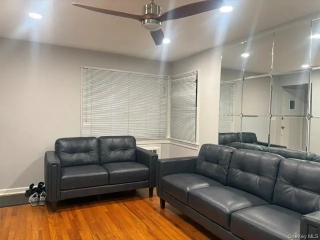 Mirrored Wall and Natural wood floor. Mirrored Wall and Natural wood floor.