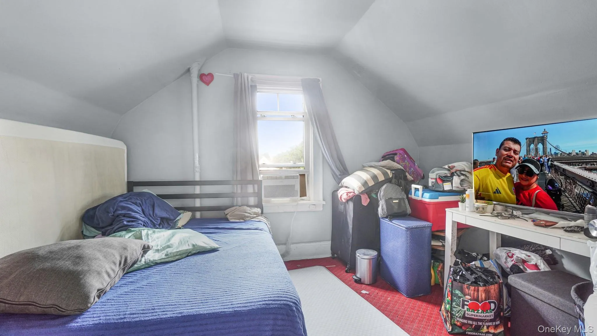 Vaulted ceiling and single-pane window Vaulted ceiling and single-pane window
