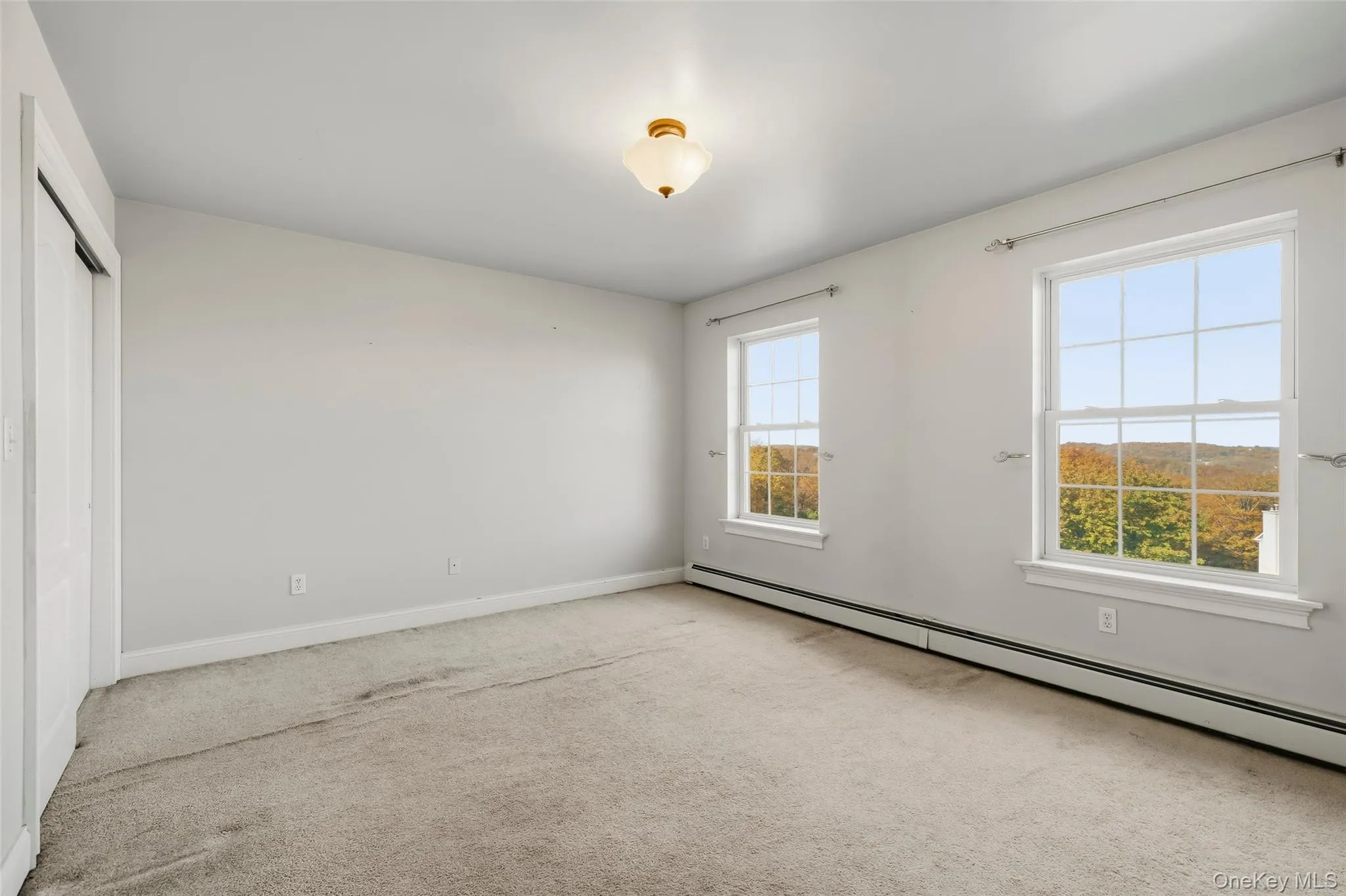 Carpet, ceiling fan, closet Carpet, ceiling fan, closet