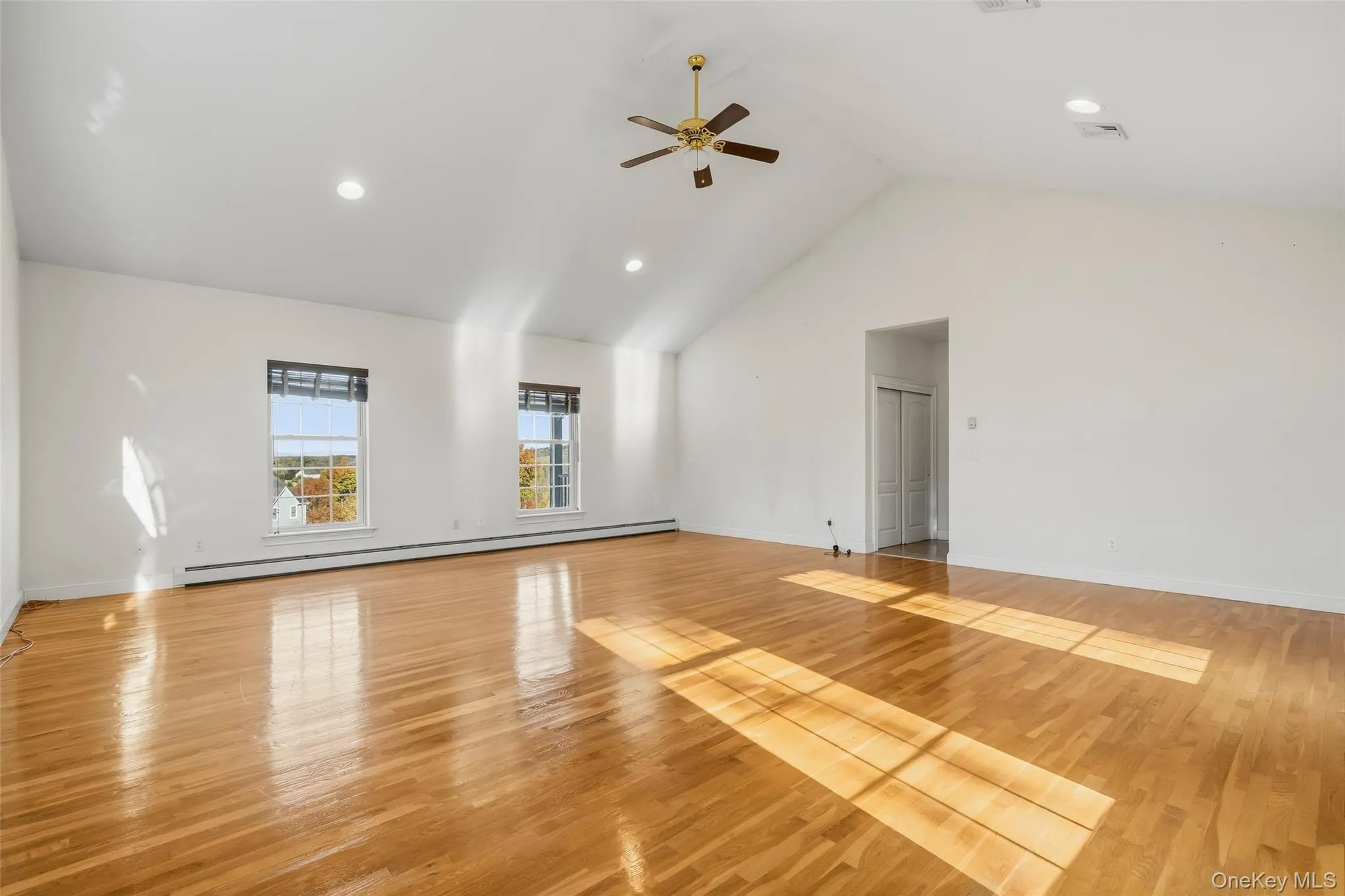 Cathedral ceiling, hardwood floors, recessed lighting Cathedral ceiling, hardwood floors, recessed lighting