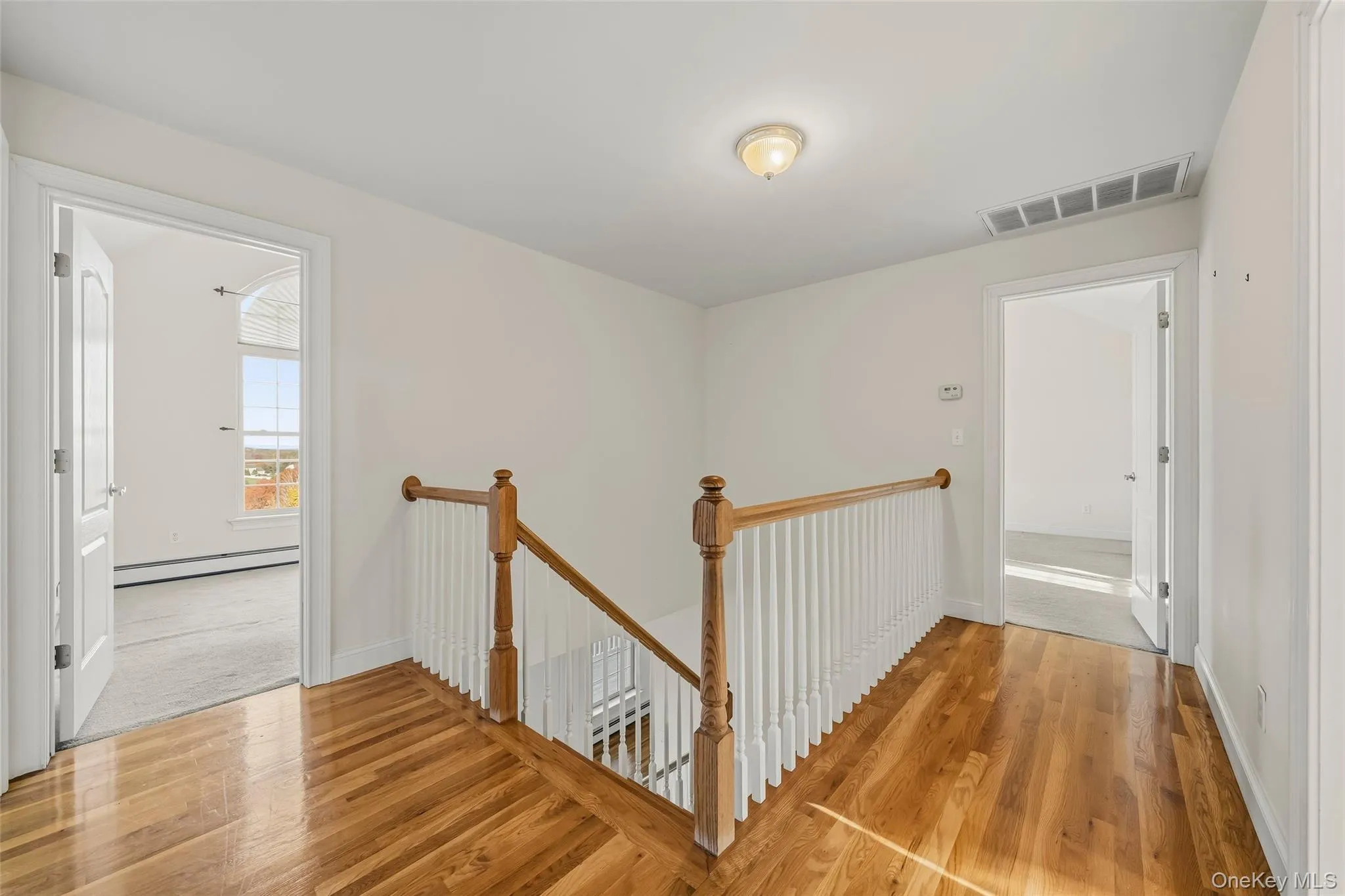 Second floor hallway, hardwood floors Second floor hallway, hardwood floors