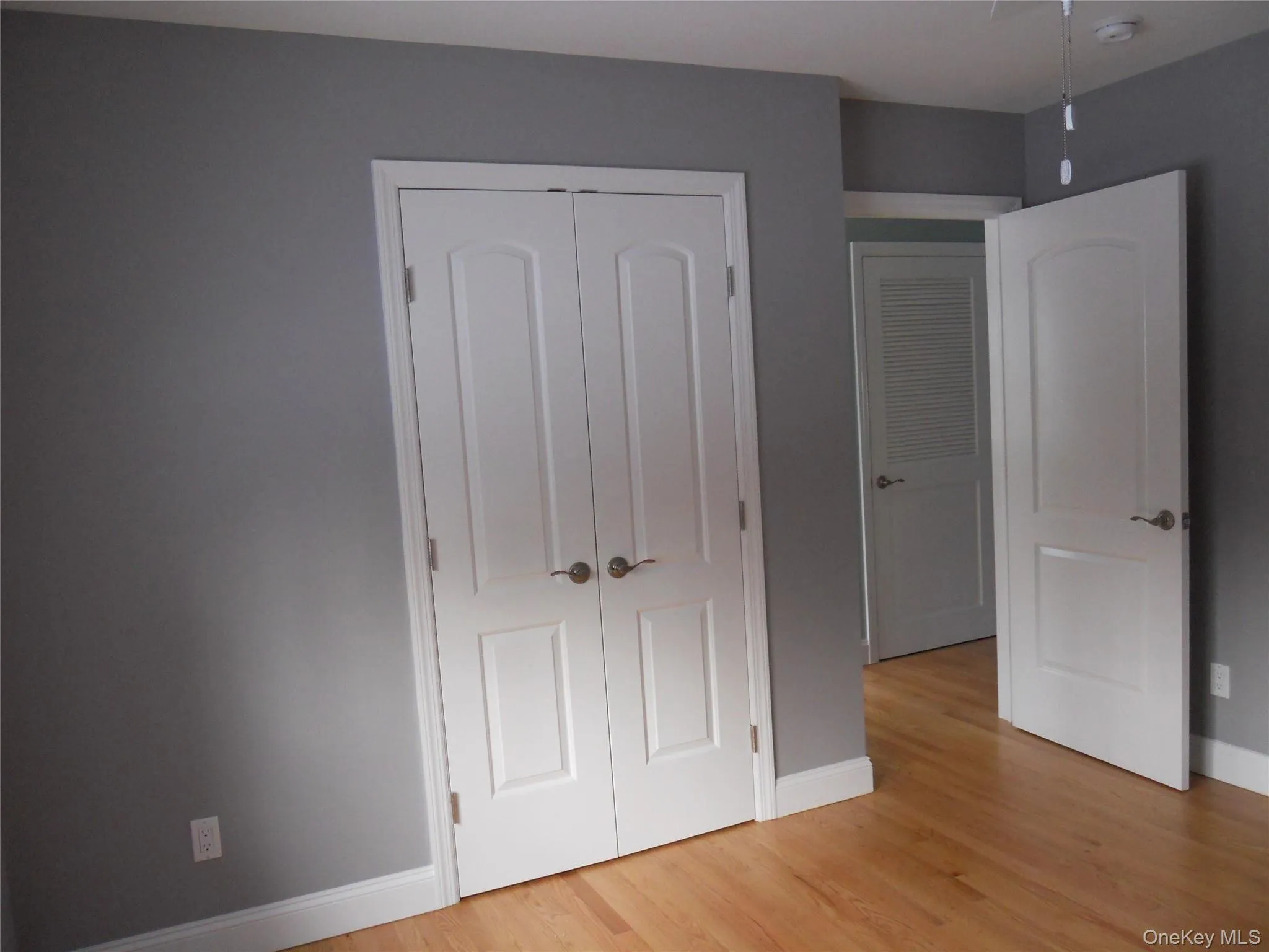 Primary bedroom, closet view. Primary bedroom, closet view.