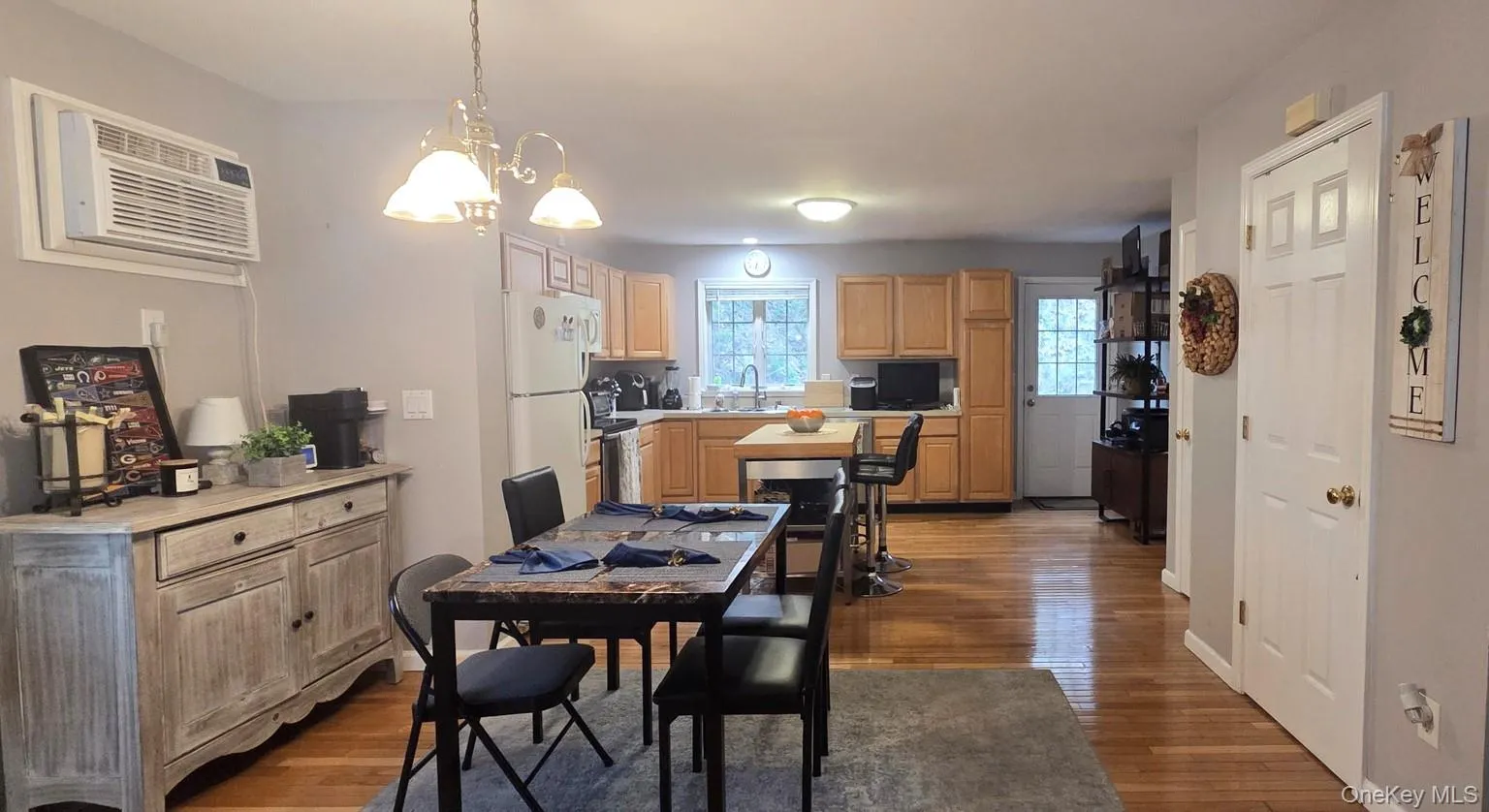 Dining area is open to kitchen and living room Dining area is open to kitchen and living room