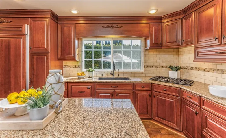 Kitchen has Built in Fridge and high end appliances.