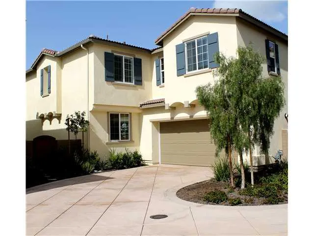 The garage is at the back of the home with space for 2 cars inside and 2 in driveway