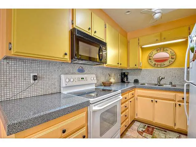 Beautiful stone countertops, tile backsplash
