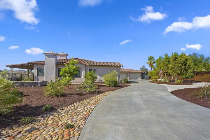 Driveway entrance to this magnificent 1.9 acre property