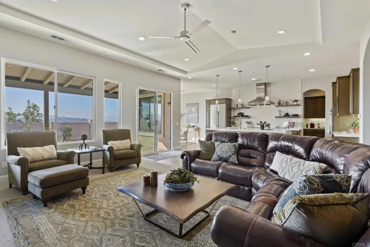 Very open and inviting family room looking back towards kitchen
