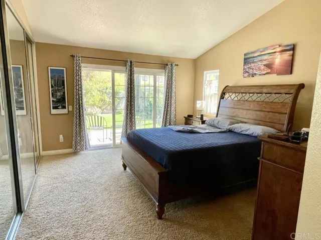 Master bedroom ensuite. Slider leads to rear patio/yard.