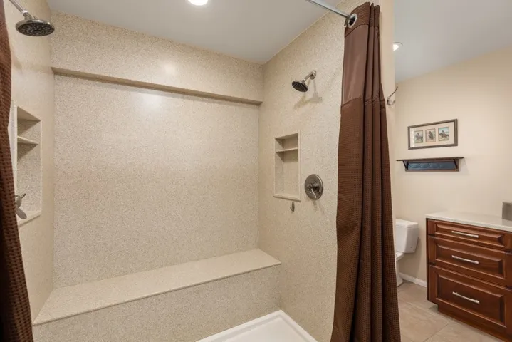Twin Shower heads with Corian Surround
