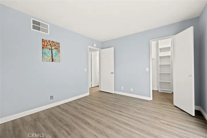 Master bedroom with walk-in closet.