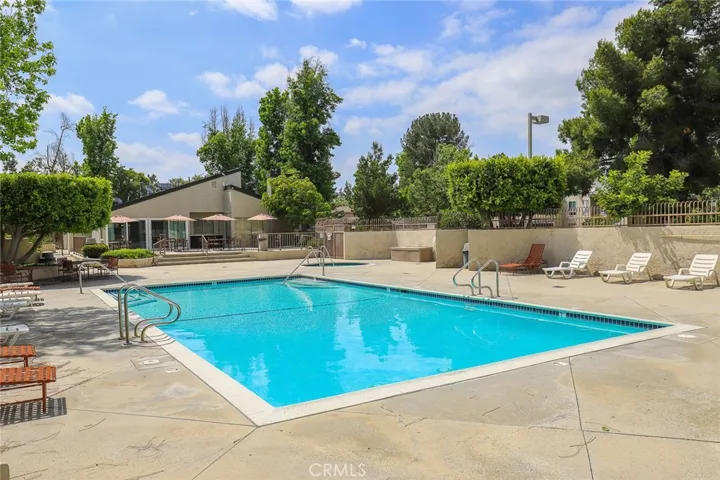 Association features swimming pool, spa.