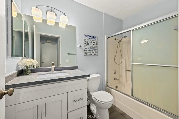 Bathroom with new quartz countertop and cabinet.