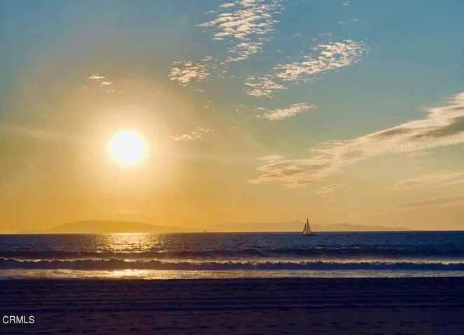 Shores sailboat at sunset