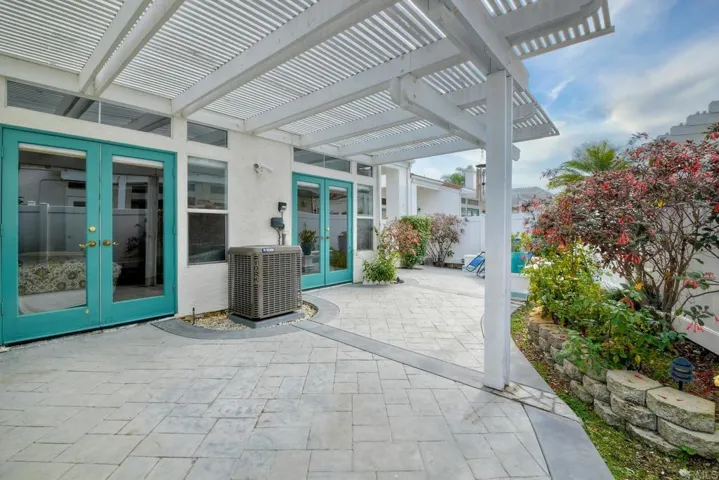 Doors from patio to access the Bedrooms and Living Room.