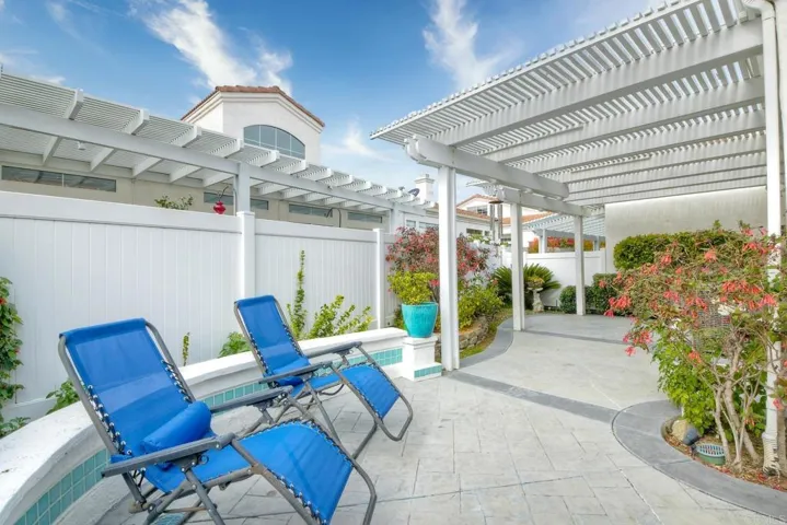 Large entertaining patio. Sitting area as well as area for dining.