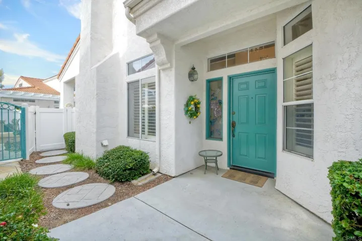 Front door with path to access the patio.