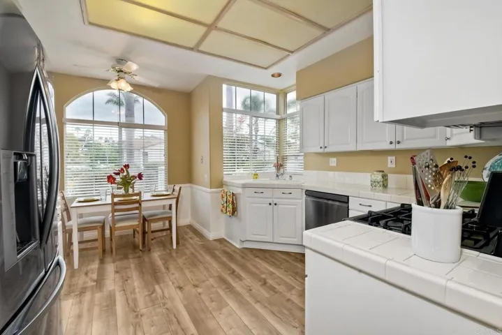 Light and bright Kitchen with eating area. Measures 10 x 9